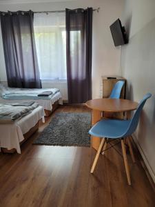 Postel nebo postele na pokoji v ubytování Gościniec Pokoje Noclegowe Drawsko Pomorskie