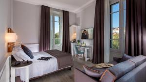 Voodi või voodid majutusasutuse Princeps Boutique Hotel toas