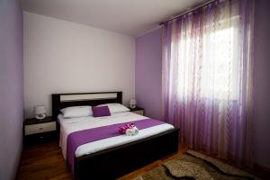 Postel nebo postele na pokoji v ubytování Rogoznica Apartments Kristina
