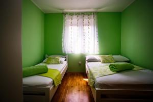Postel nebo postele na pokoji v ubytování Rogoznica Apartments Kristina
