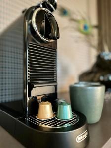 a coffee maker sitting on top of a counter at Spar Hotel Gårda in Gothenburg