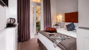 Voodi või voodid majutusasutuse Princeps Boutique Hotel toas