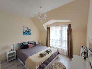 Ένα ή περισσότερα κρεβάτια σε δωμάτιο στο Beachfront Panoramic Flat @ South Bay residence +19 φωτογραφίες