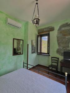 Posteľ alebo postele v izbe v ubytovaní Agriturismo Piano di Andrea