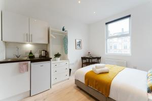 Η κουζίνα ή μικρή κουζίνα στο The Finsbury Park Star Apartments