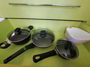 a group of utensils sitting on top of a table at Kosmos in Daugavpils