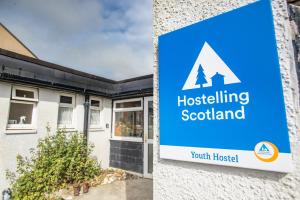 a sign for a hospital in front of a building at Kirkwall Youth Hostel in Kirkwall