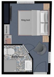 a floor plan of a bedroom with a king bed and a bathroom at St John's Guest House in Weymouth