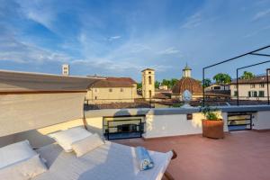 Μπαλκόνι ή βεράντα στο Attico con grande terrazza e vista sulla città