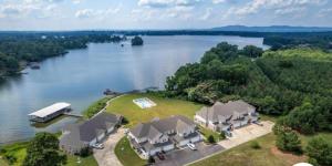 an aerial view of a house on the water at P2 - Hot Springs 4 Bedroom Condo in Lake Hamilton