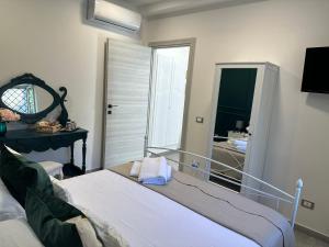 Postel nebo postele na pokoji v ubytování Le Case Col Sole da Silvia INTERNO 1