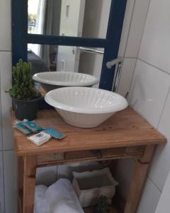 Um banheiro em Chalézinho Santorini