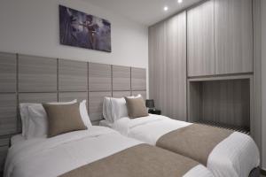 Ein Bett oder Betten in einem Zimmer der Unterkunft Zett hotel