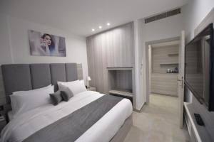 Ein Bett oder Betten in einem Zimmer der Unterkunft Zett hotel
