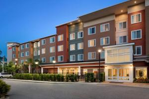 a rendering of a building with a parking lot at Residence Inn by Marriott Charleston North/Ashley Phosphate in Charleston