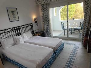 Ένα ή περισσότερα κρεβάτια σε δωμάτιο στο Camera Aqua marin centralissima +19 φωτογραφίες