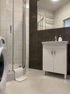 Ванная комната в Apartament Komfortowy