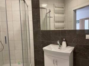 Ванная комната в Apartament Komfortowy