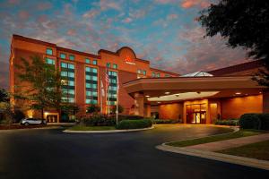 a hotel with a car parked in front of it at Marriott Birmingham Grandview in Acton
