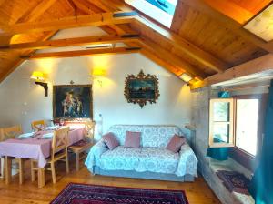 a living room with a couch and a table at Apartment Korcula Town in Korčula