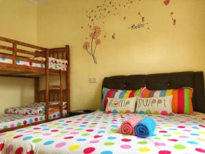 Krevet ili kreveti na kat u jedinici u objektu 幸福园 Little Happiness Homestay Pulau Ketam