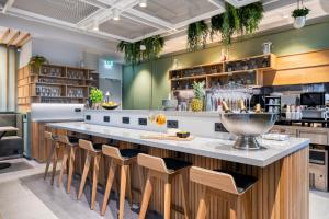 Kuchyňa alebo kuchynka v ubytovaní Citadines Danube Vienna