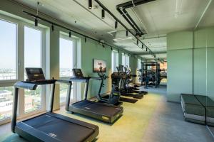 Posilňovňa alebo fitness centrum v ubytovaní Citadines Danube Vienna