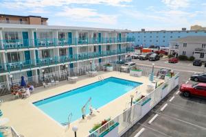 an overhead view of a pool on a apartment complex at Dunes Suites Oceanfront in Ocean City