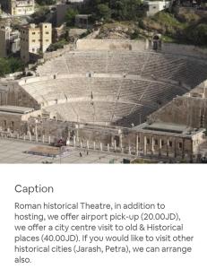 een foto van een arena met een foto van een leeg stadion bij Feel home always in Amman