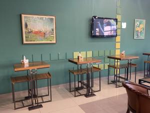 TV a/nebo společenská místnost v ubytování Gandzak Hotel