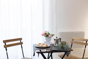 Area soggiorno di The HeArt Guest House