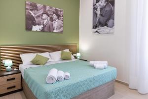 Letto o letti in una camera di The HeArt Guest House
