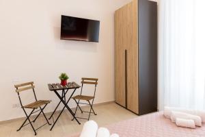 TV o dispositivi per l'intrattenimento presso The HeArt Guest House