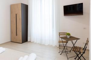 TV o dispositivi per l'intrattenimento presso The HeArt Guest House