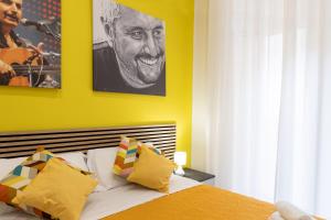 Letto o letti in una camera di The HeArt Guest House
