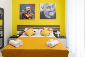 Letto o letti in una camera di The HeArt Guest House