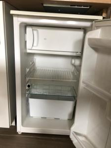 an empty refrigerator with its door open and its door at STUDIO COSY STRASBOURG CENTRE TRAM in Strasbourg