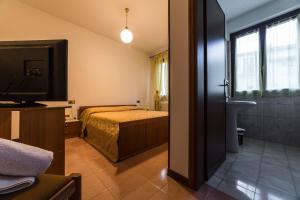 Postel nebo postele na pokoji v ubytování B&B Il Centrale