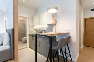 Køkken eller tekøkken på Olive Apartments