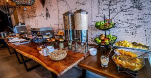 a table with bowls of fruit on top of it at EcoApart Antofagasta in Antofagasta