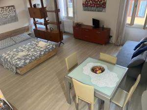 En eller flere senge i et værelse på Casa Vacanze Il Canale