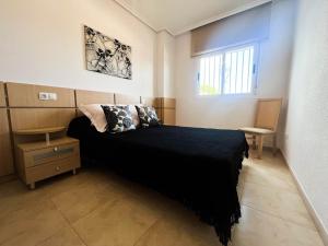 Postel nebo postele na pokoji v ubytování El Chalet