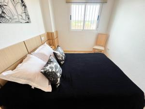 Postel nebo postele na pokoji v ubytování El Chalet