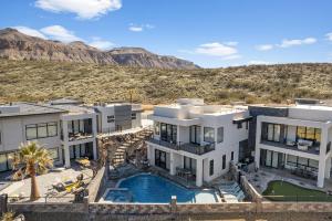 an aerial view of a house with a swimming pool at ZION TREASURE - RUBY at Copper Rock! in Hurricane