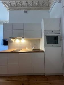 Η κουζίνα ή μικρή κουζίνα στο Apartament Jadwisia