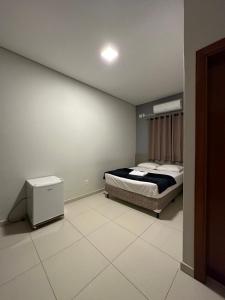 Postel nebo postele na pokoji v ubytování Shafira Hotel