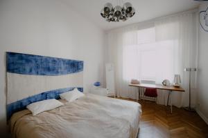 Posteľ alebo postele v izbe v ubytovaní Space Age Residence
