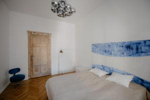 Posteľ alebo postele v izbe v ubytovaní Space Age Residence