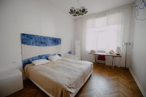 Posteľ alebo postele v izbe v ubytovaní Space Age Residence
