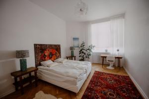 Posteľ alebo postele v izbe v ubytovaní Space Age Residence